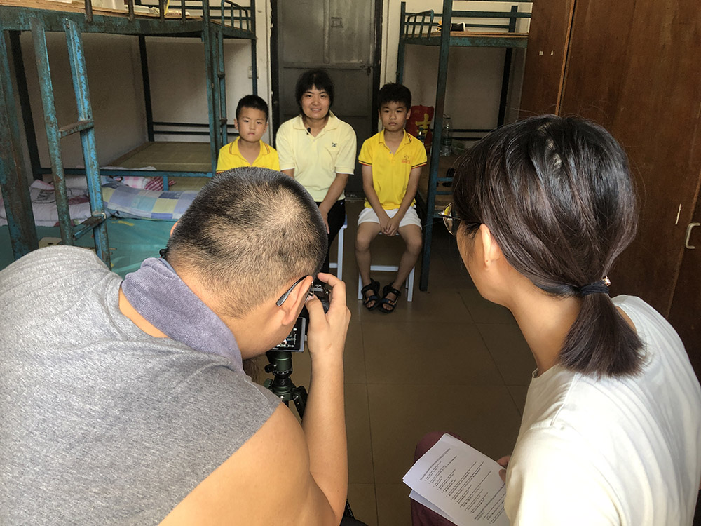 The China project team interviewing children and parent workers who participated in a WeCare family-friendly workplaces programme